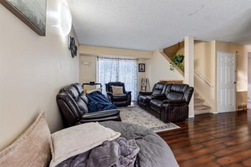 48 Falton Way Ne, Calgary, AB - Indoor Photo Showing Living Room