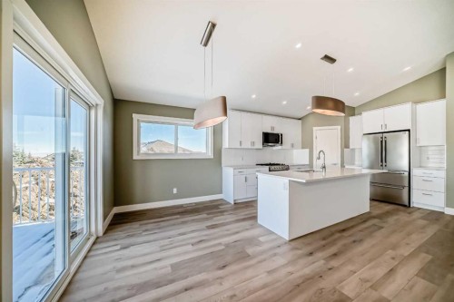 2017 30 Avenue, Nanton, AB - Indoor Photo Showing Kitchen With Stainless Steel Kitchen With Upgraded Kitchen