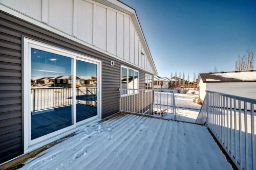 2017 30 Avenue, Nanton, AB - Outdoor With Deck Patio Veranda With Exterior