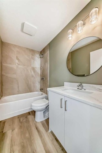 2017 30 Avenue, Nanton, AB - Indoor Photo Showing Bathroom