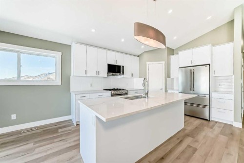 2017 30 Avenue, Nanton, AB - Indoor Photo Showing Kitchen With Stainless Steel Kitchen With Upgraded Kitchen