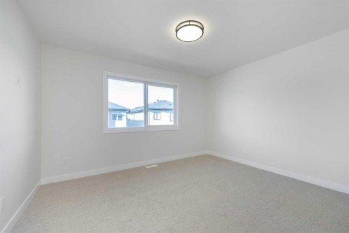 126 Sandpiper Bend, Chestermere, AB - Indoor Photo Showing Other Room