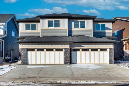 126 Sandpiper Bend, Chestermere, AB - Outdoor With Facade