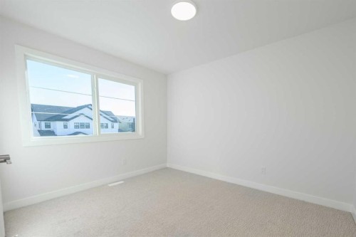 126 Sandpiper Bend, Chestermere, AB - Indoor Photo Showing Other Room