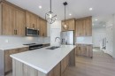 126 Sandpiper Bend, Chestermere, AB  - Indoor Photo Showing Kitchen With Double Sink With Upgraded Kitchen 