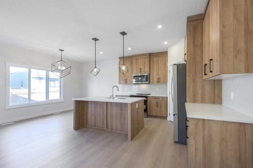 126 Sandpiper Bend, Chestermere, AB - Indoor Photo Showing Kitchen