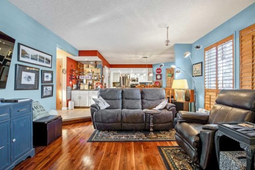 135 Canter Place Sw, Calgary, AB - Indoor Photo Showing Living Room