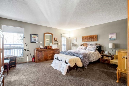 135 Canter Place Sw, Calgary, AB - Indoor Photo Showing Bedroom