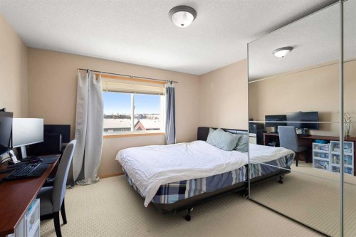 146 Panamount Villas Nw, Calgary, AB - Indoor Photo Showing Bedroom