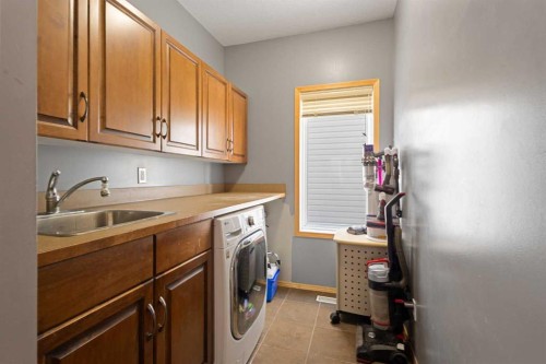 146 Panamount Villas Nw, Calgary, AB - Indoor Photo Showing Laundry Room