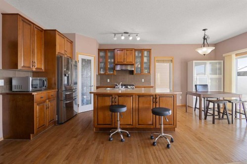 146 Panamount Villas Nw, Calgary, AB - Indoor Photo Showing Kitchen With Double Sink
