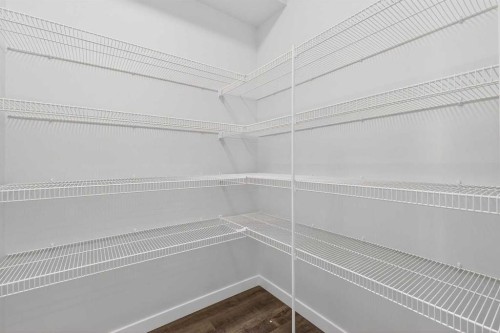 103-40 Creekside Way Sw, Calgary, AB - Indoor With Storage