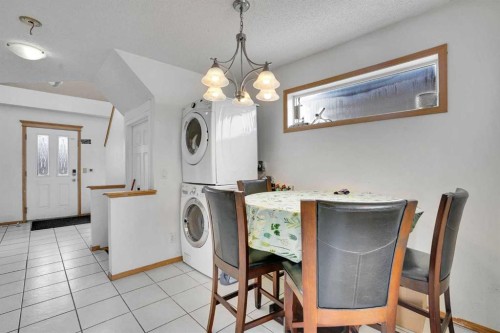 162 Taradale Drive Ne, Calgary, AB - Indoor Photo Showing Laundry Room