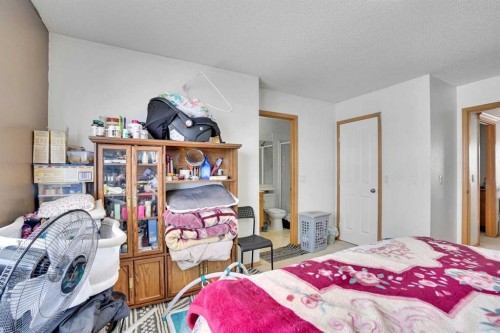 162 Taradale Drive Ne, Calgary, AB - Indoor Photo Showing Bedroom