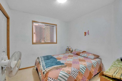 162 Taradale Drive Ne, Calgary, AB - Indoor Photo Showing Bedroom