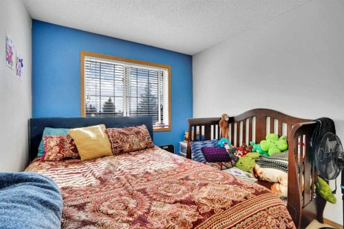 162 Taradale Drive Ne, Calgary, AB - Indoor Photo Showing Bedroom