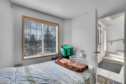 162 Taradale Drive Ne, Calgary, AB - Indoor Photo Showing Bedroom