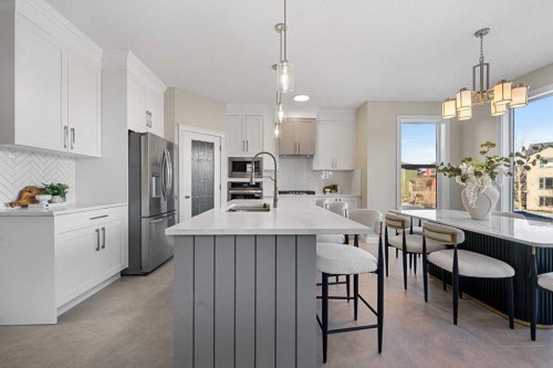 125 Seagreen Passage, Chestermere, AB - Indoor Photo Showing Kitchen With Stainless Steel Kitchen With Upgraded Kitchen