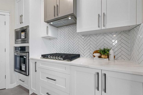 125 Seagreen Passage, Chestermere, AB - Indoor Photo Showing Kitchen With Upgraded Kitchen