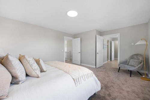 125 Seagreen Passage, Chestermere, AB - Indoor Photo Showing Bedroom