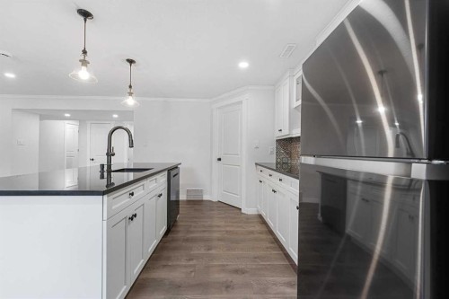 125 Seagreen Passage, Chestermere, AB - Indoor Photo Showing Kitchen With Upgraded Kitchen