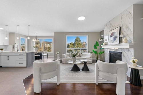 125 Seagreen Passage, Chestermere, AB - Indoor Photo Showing Living Room With Fireplace