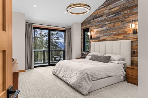 117 Silvertip Ridge, Canmore, AB - Indoor Photo Showing Bedroom