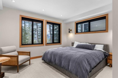 117 Silvertip Ridge, Canmore, AB - Indoor Photo Showing Bedroom