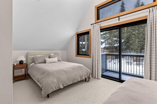 117 Silvertip Ridge, Canmore, AB - Indoor Photo Showing Bedroom
