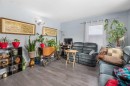 8015 25 Street Se, Calgary, AB  - Indoor Photo Showing Living Room 