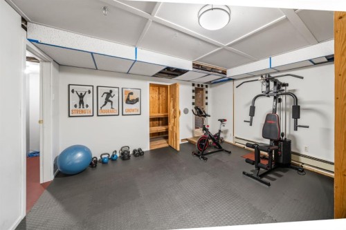 327 Silvertip Close, Canmore, AB - Indoor Photo Showing Gym Room