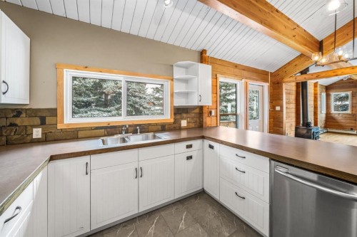 327 Silvertip Close, Canmore, AB - Indoor Photo Showing Kitchen With Double Sink