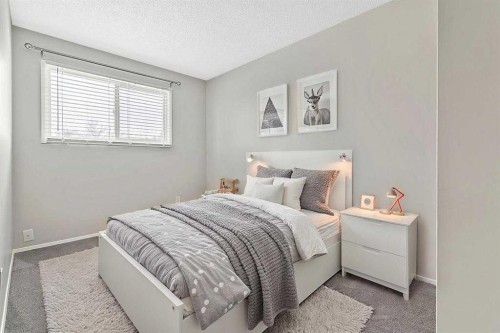 129 Berwick Drive Nw, Calgary, AB - Indoor Photo Showing Bedroom