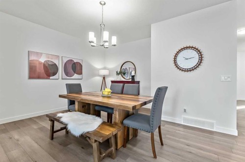 882 Bluerock Way Sw, Calgary, AB - Indoor Photo Showing Dining Room