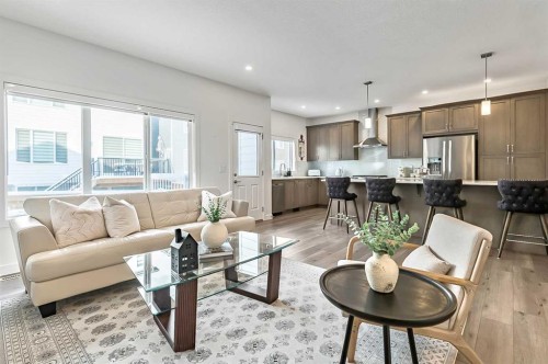 882 Bluerock Way Sw, Calgary, AB - Indoor Photo Showing Living Room