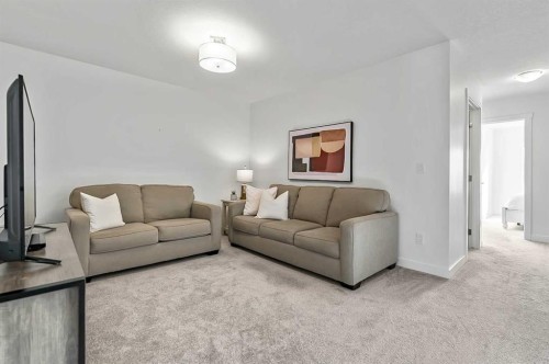 882 Bluerock Way Sw, Calgary, AB - Indoor Photo Showing Living Room