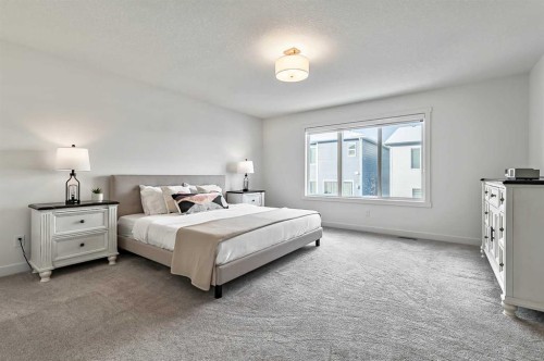 882 Bluerock Way Sw, Calgary, AB - Indoor Photo Showing Bedroom