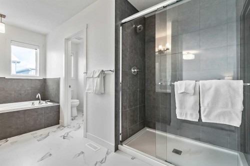 882 Bluerock Way Sw, Calgary, AB - Indoor Photo Showing Bathroom