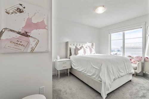 882 Bluerock Way Sw, Calgary, AB - Indoor Photo Showing Bedroom