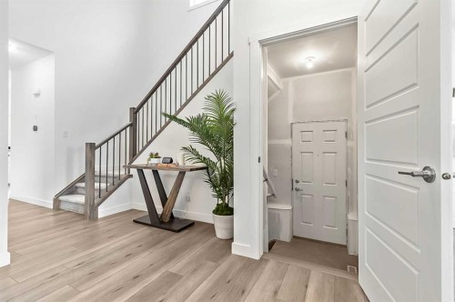 882 Bluerock Way Sw, Calgary, AB - Indoor Photo Showing Other Room