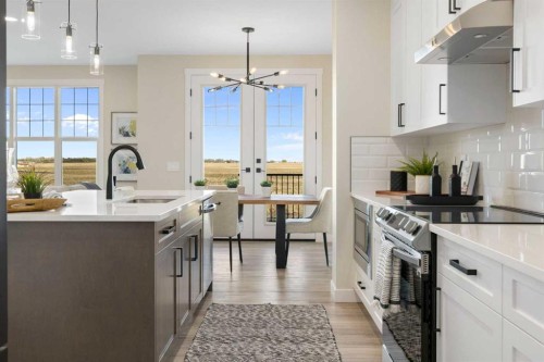 458 Kinniburgh Loop, Chestermere, AB - Indoor Photo Showing Kitchen With Upgraded Kitchen