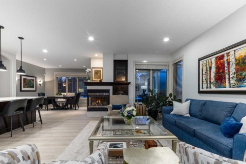 551 Evergreen Circle Sw, Calgary, AB - Indoor Photo Showing Living Room With Fireplace