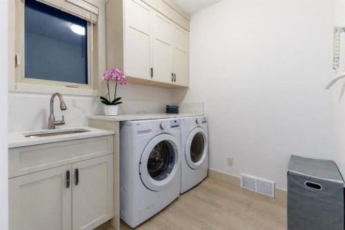 551 Evergreen Circle Sw, Calgary, AB - Indoor Photo Showing Laundry Room