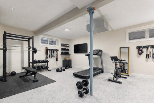 551 Evergreen Circle Sw, Calgary, AB - Indoor Photo Showing Gym Room