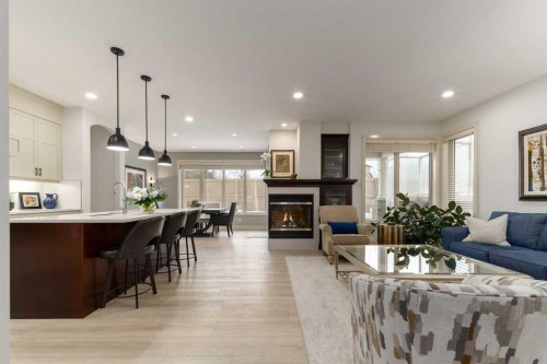 551 Evergreen Circle Sw, Calgary, AB - Indoor Photo Showing Other Room With Fireplace