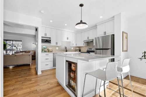 77 Point Drive Nw, Calgary, AB - Indoor Photo Showing Kitchen With Upgraded Kitchen