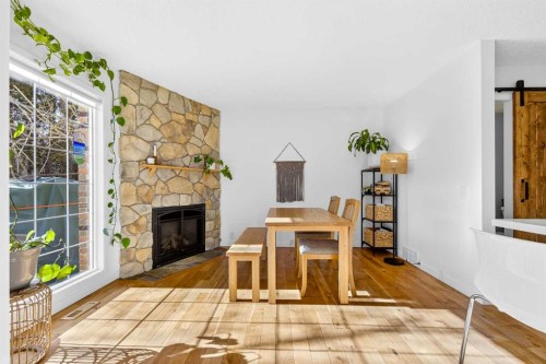 77 Point Drive Nw, Calgary, AB - Indoor With Fireplace