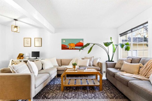 77 Point Drive Nw, Calgary, AB - Indoor Photo Showing Living Room
