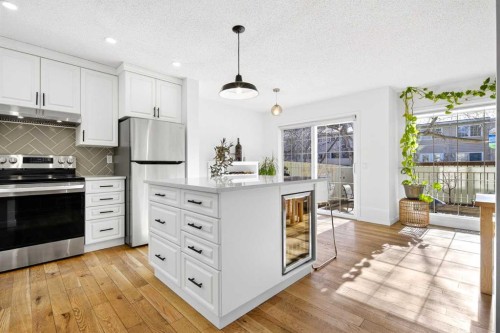 77 Point Drive Nw, Calgary, AB - Indoor Photo Showing Kitchen With Upgraded Kitchen