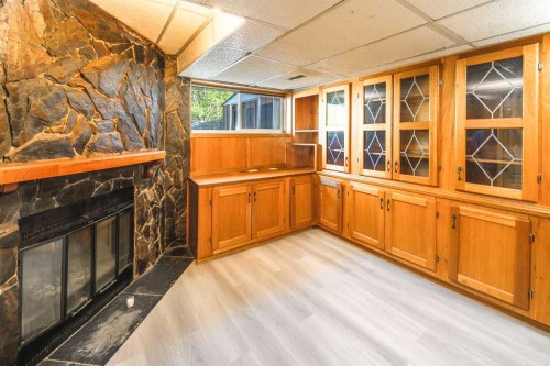 20 Bernard Way Nw, Calgary, AB - Indoor With Fireplace